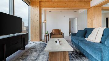 Apartment (2 Bedrooms) | Living area | 50-inch TV with digital channels