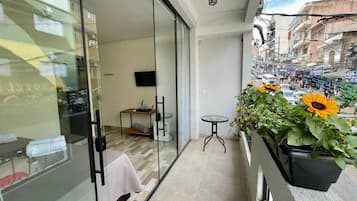 Standard Triple Room, Balcony, City View | Terrace/patio