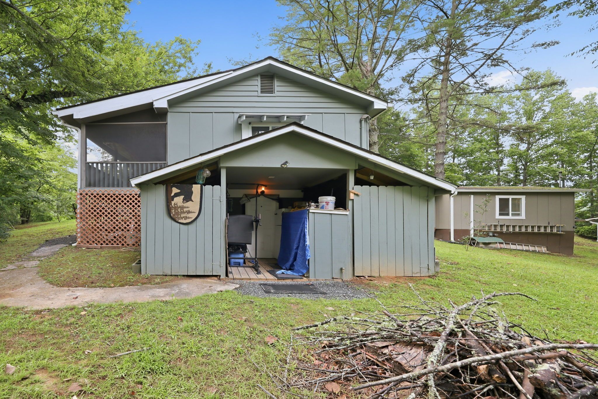 A single-story house with a garage and a covered porch.
