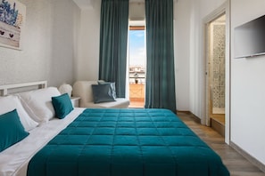 Deluxe tweepersoonskamer, balkon, uitzicht op de stad | Gratis wifi