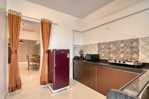Appartement Luxe, balcon, vue ville | Cuisine privée