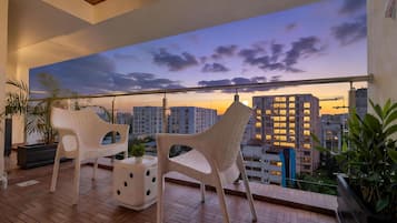 Family Apartment, City View | Living area | LED TV