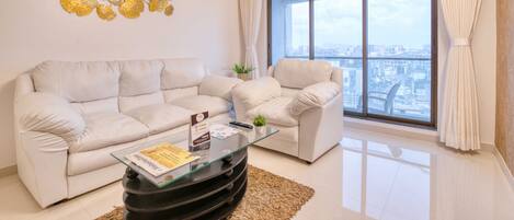 Luxury Apartment, Balcony, City View | Living area | LED TV