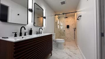 Hair dryer, towels, soap, toilet paper