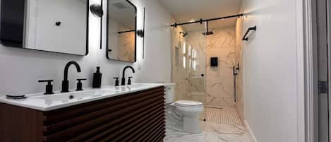 Hair dryer, towels, soap, toilet paper