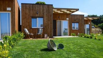 Bungalow, patio, vista giardino | Parco della struttura