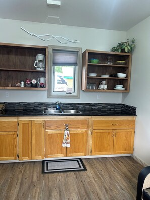 Interior - Enjoy cozy living space, has everything you need for a comfortable stay. (Crawford Bay)
