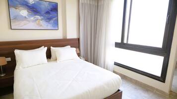 Suite, 1 Bedroom | In-room safe, blackout curtains, iron/ironing board (on request)