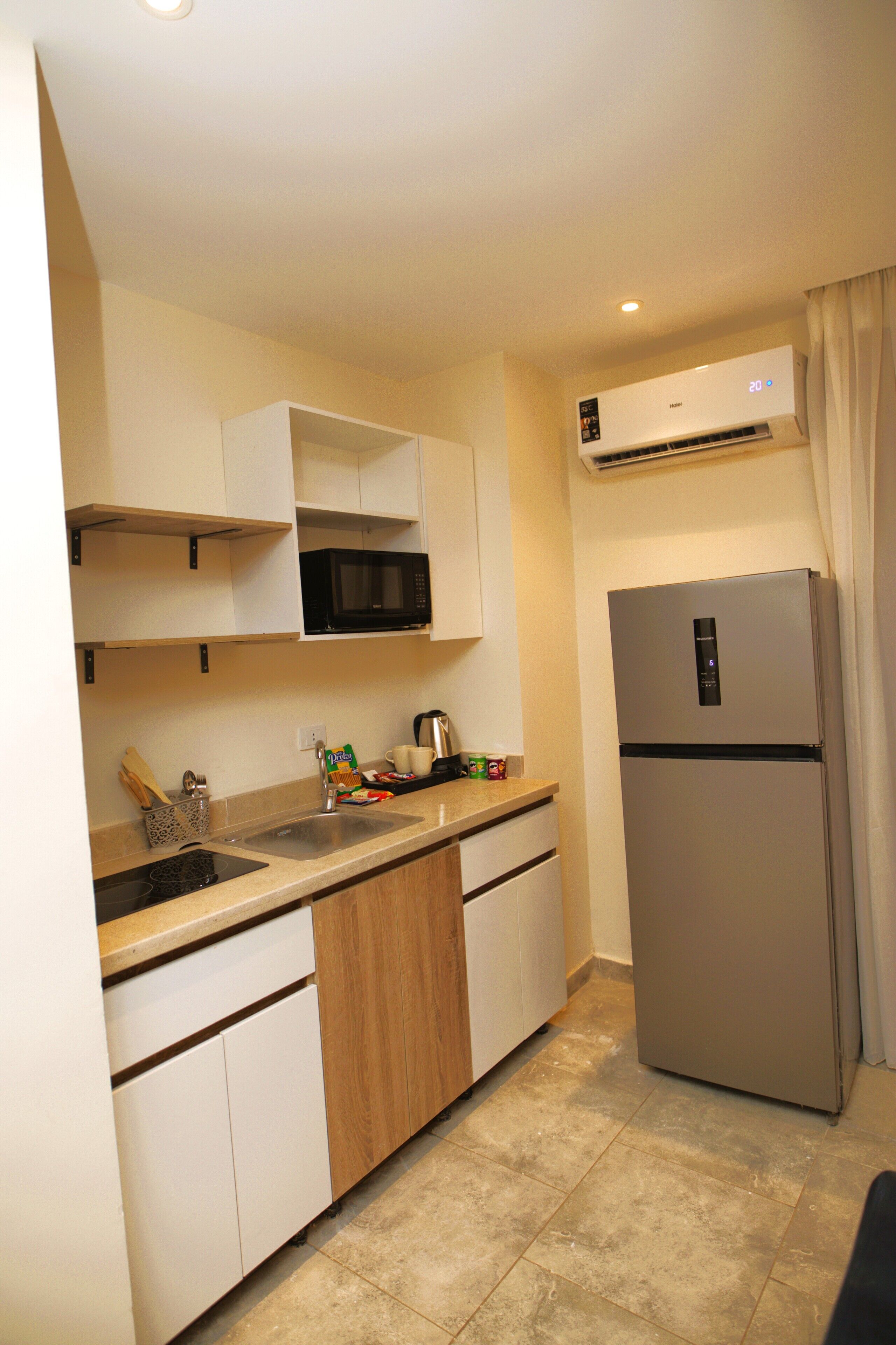 Microwave, stovetop, cookware/dishes/utensils