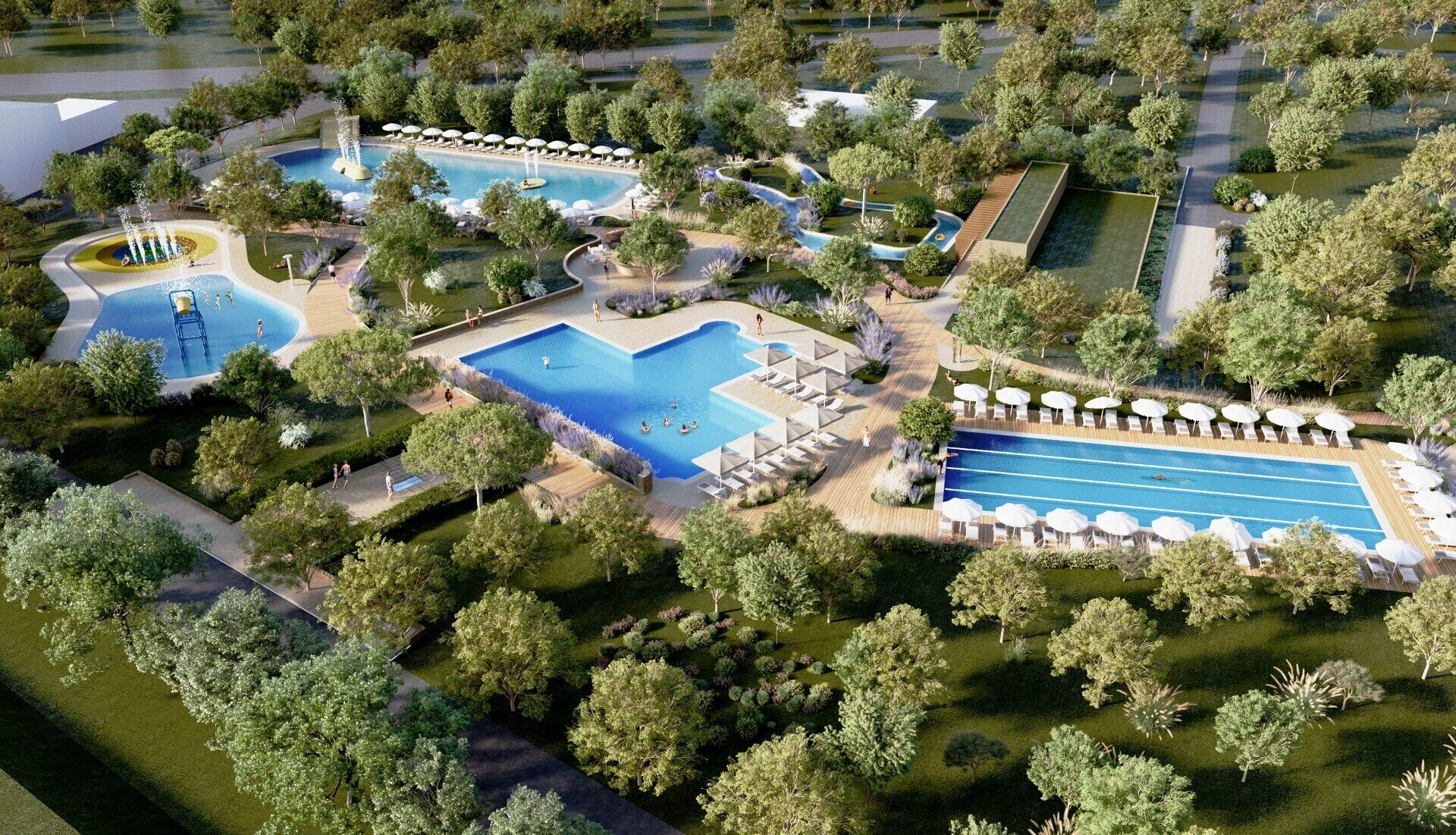 Vista aérea de un complejo turístico con múltiples piscinas, tumbonas y jardines ajardinados.