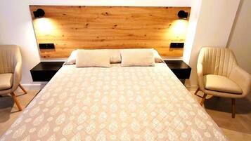 1 dormitorio, tabla de planchar con plancha, cuna de viaje y wifi