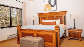 Tabla de planchar con plancha, wifi y ropa de cama