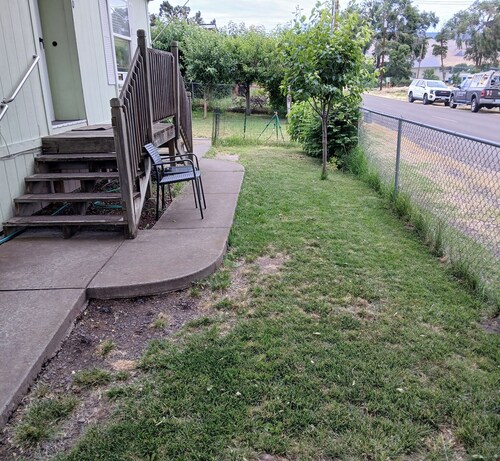 Spacious bedroom with attached private bathroom.  Off-street parking.  Dog yard.