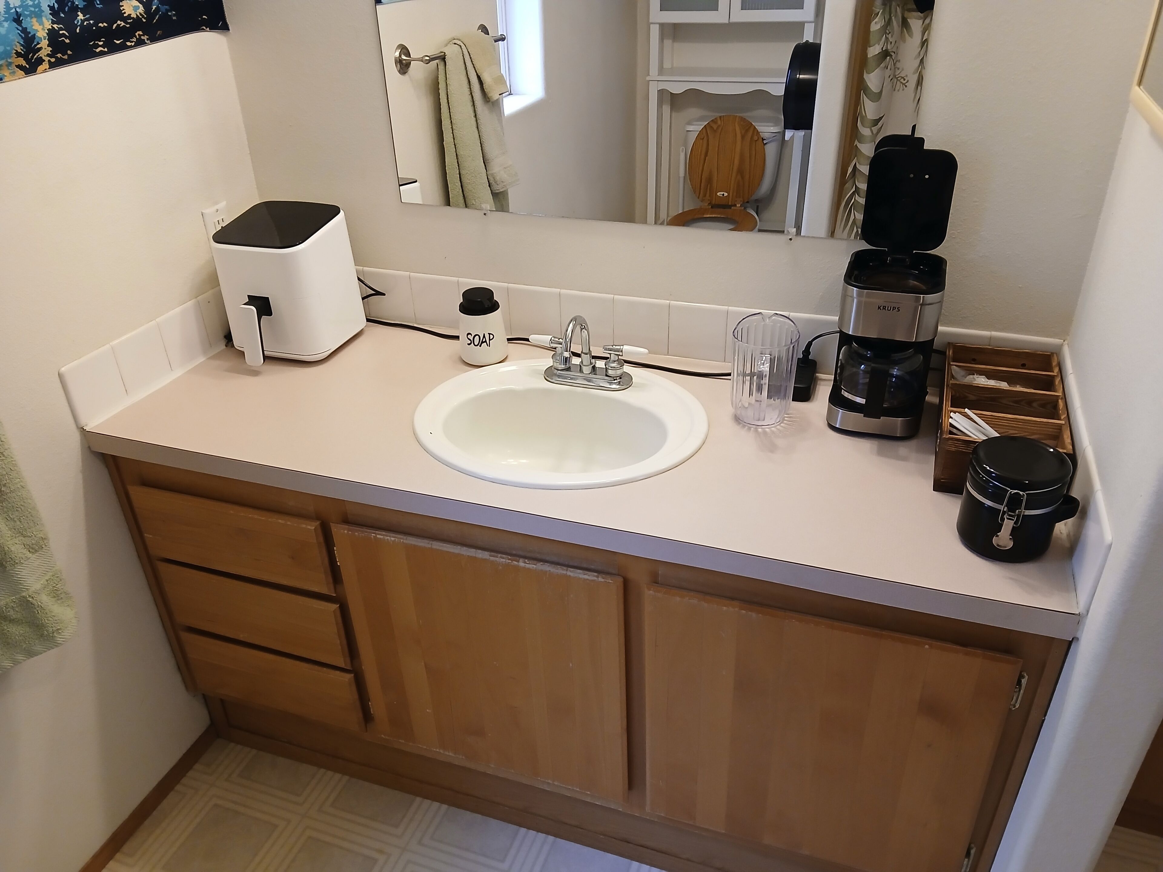 Hair dryer, towels, soap, toilet paper
