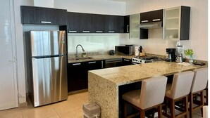 Private kitchen - Exclusive Beachfront Luxury Apartment in La Cruz de Huanacaxtle (Cruz de Huanacaxtle)