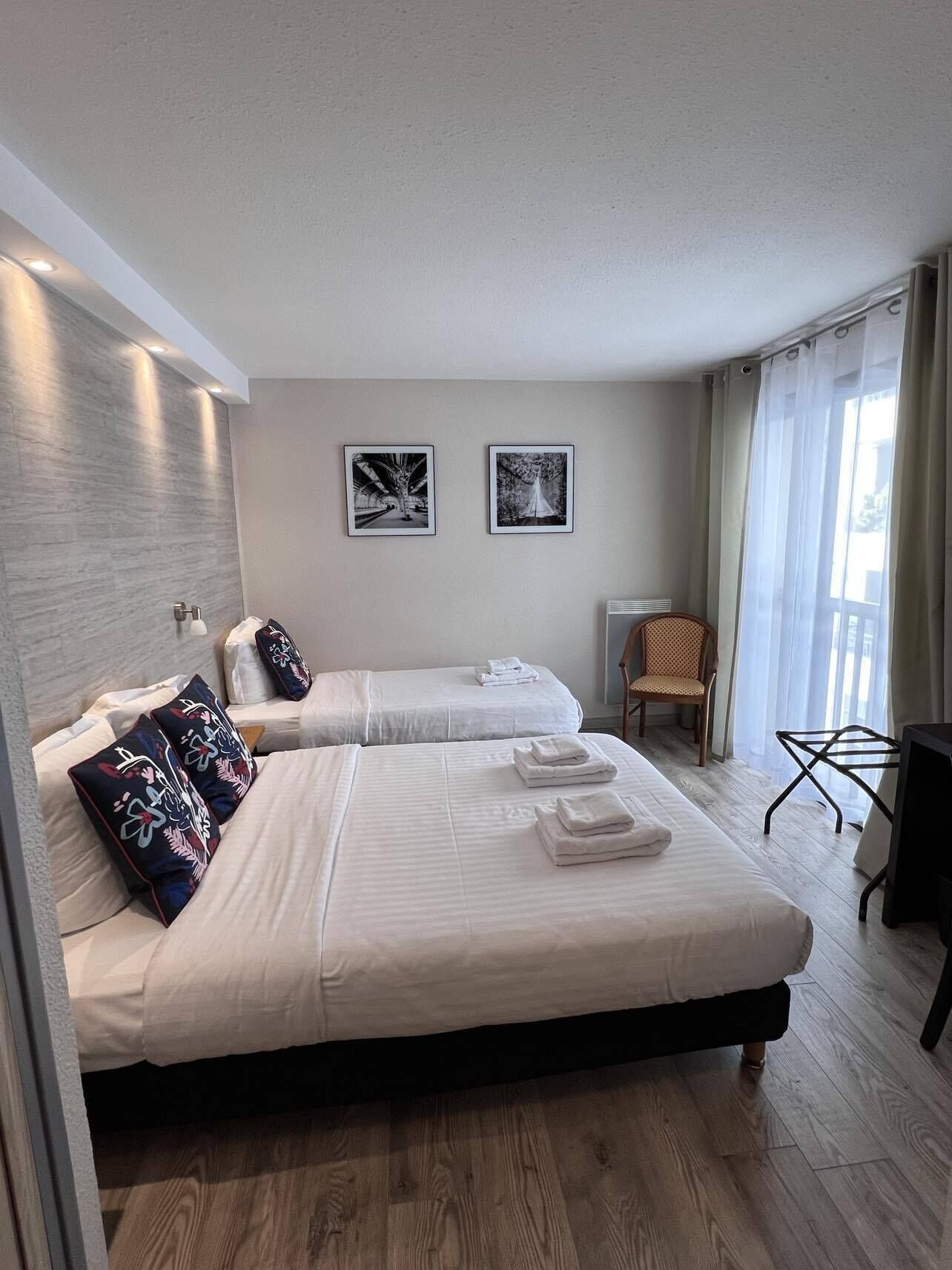 Standard Triple Room, City View | In-room safe, desk, laptop workspace, free WiFi