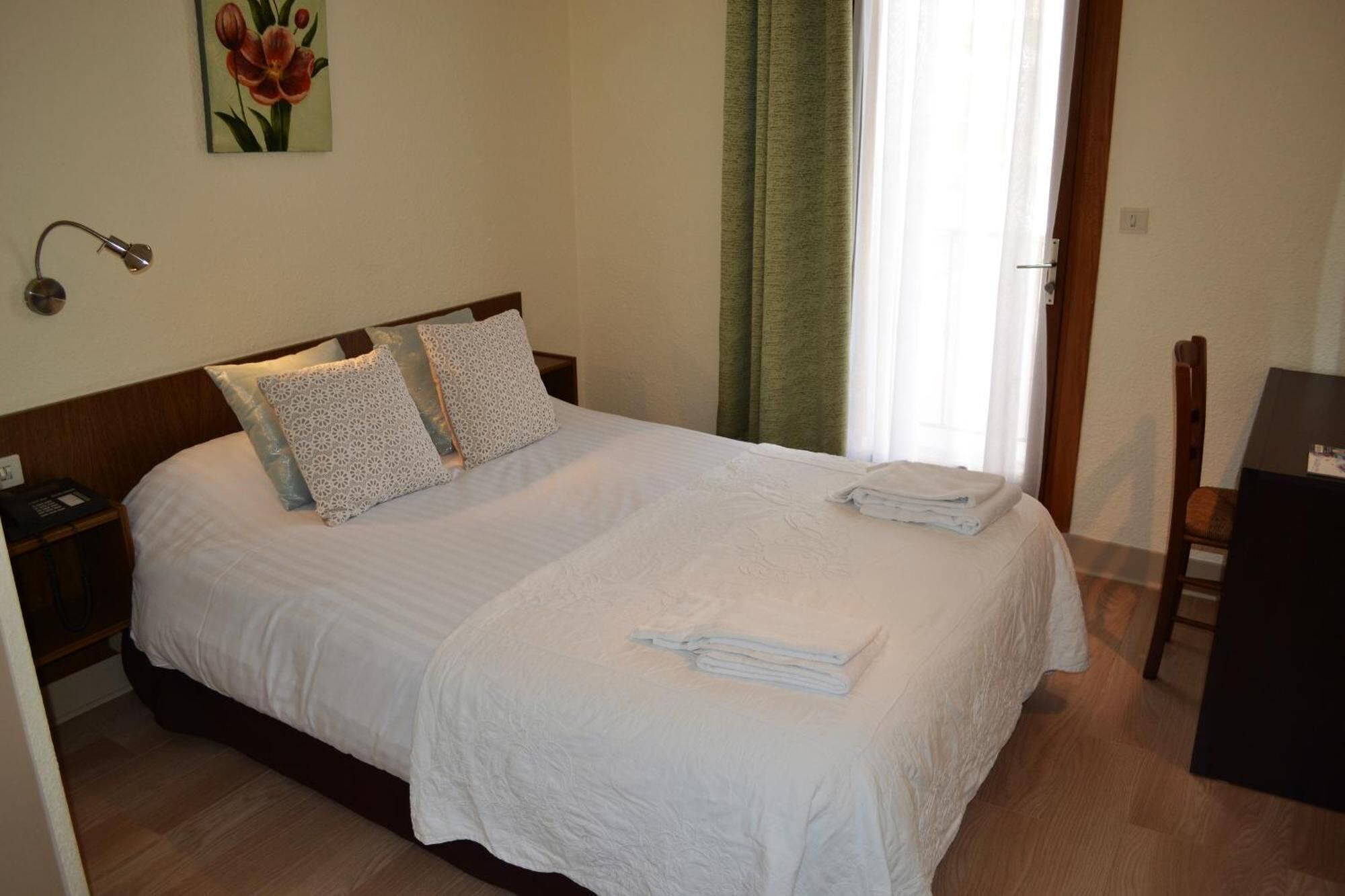 Economy Double Room, Courtyard View | In-room safe, desk, laptop workspace, free WiFi