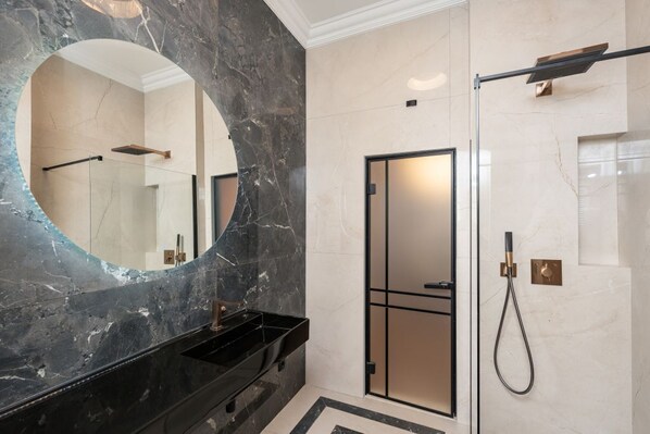 Shower, hair dryer, towels, soap