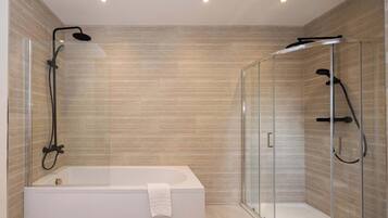 Shower, hair dryer, towels, shampoo