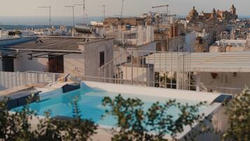 Suíte superluxo, vista para a cidade | Terraço/pátio