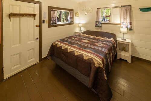 Cool Shady Cabin at Camp Layman | Restorative Forest Getaway for Two
