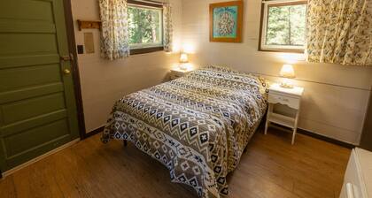 Historic Kelley Cabin at Camp Layman | Romantic Riverside Escape for Two