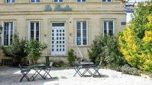 A building with the sign 'La Rodin' above the entrance.
