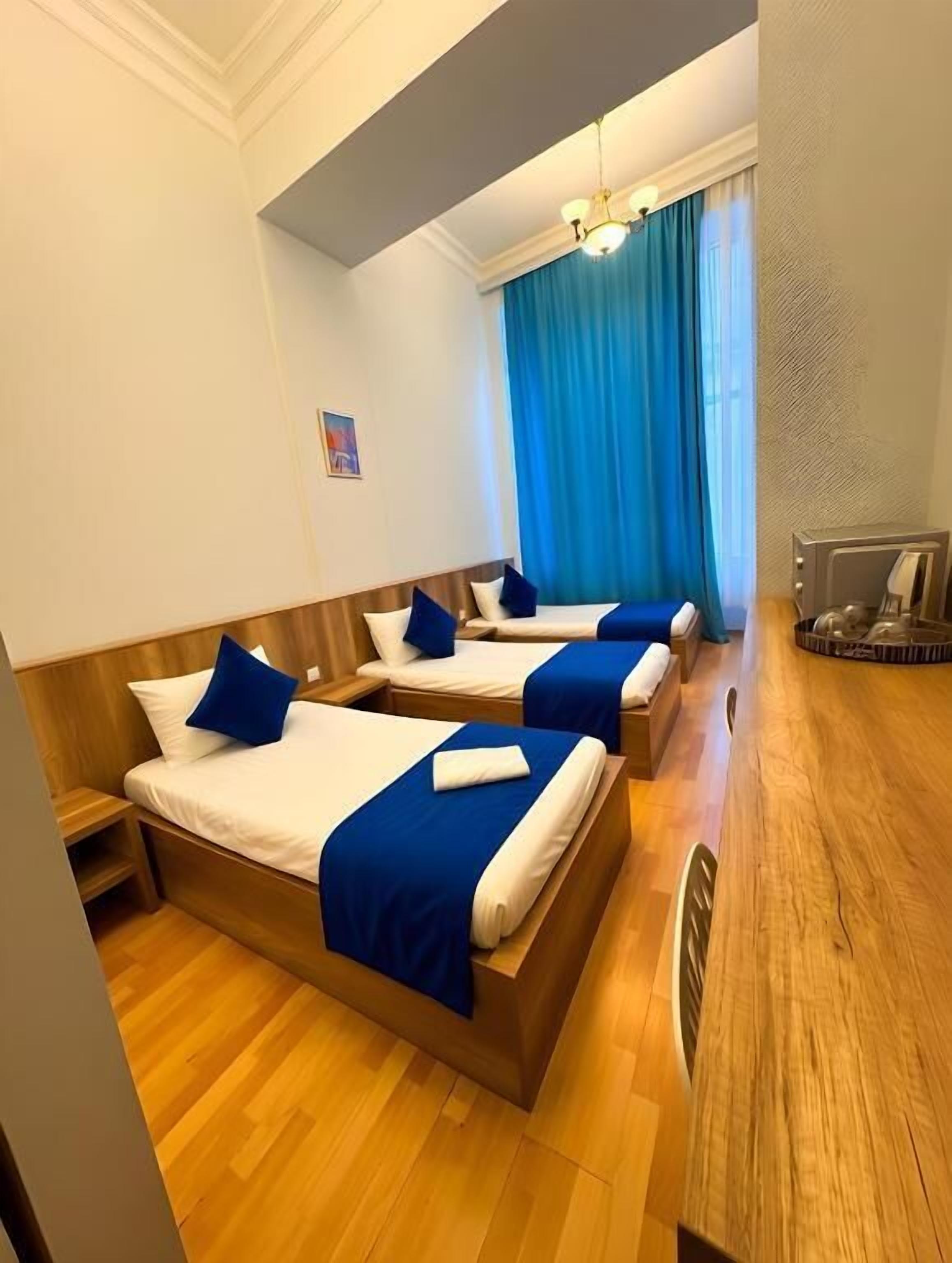 Quarto triplo standard, vista para a cidade