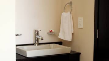 Shower, towels, soap, toilet paper
