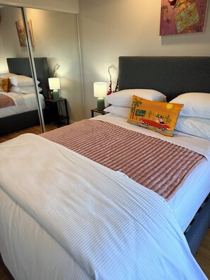 2 habitaciones, tabla de planchar con plancha, wifi y ropa de cama 