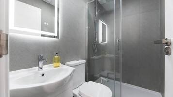 Shower, hair dryer, shampoo