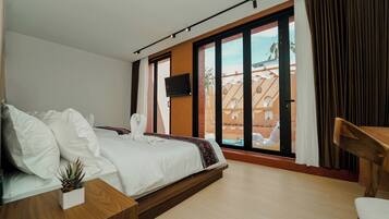 Family Villa, Pool View | Free minibar, laptop workspace, blackout curtains, iron/ironing board