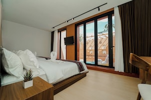 Family Villa, Pool View | Free minibar, laptop workspace, blackout drapes, iron/ironing board