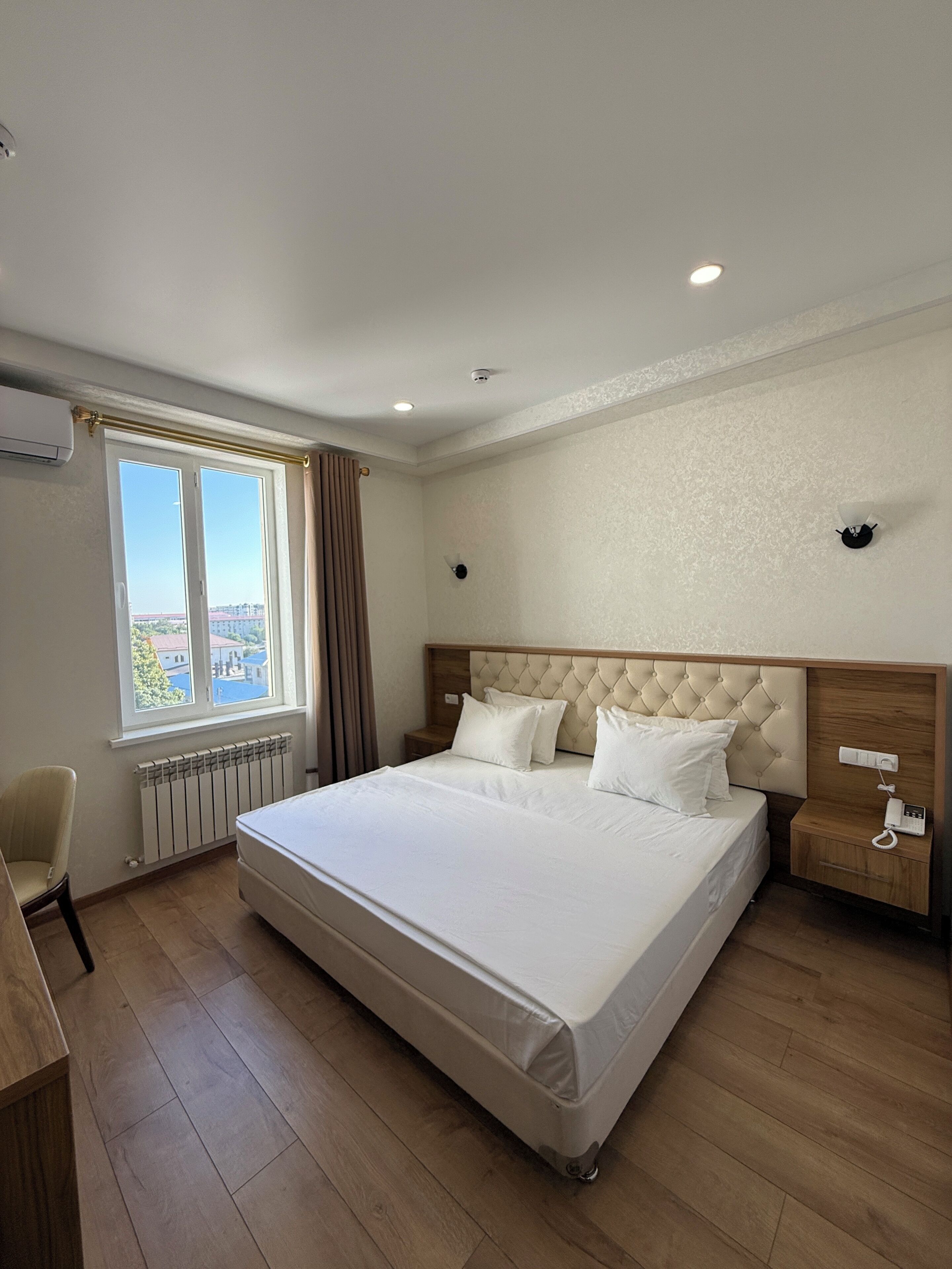 Economy Double Room, City View | Iron/ironing board (on request), free WiFi, bed sheets