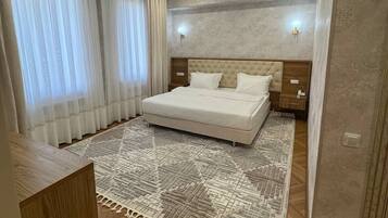 Premium Double Room, City View | Iron/ironing board, free WiFi, bed sheets