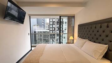 Premium bedding, down duvets, desk, laptop workspace