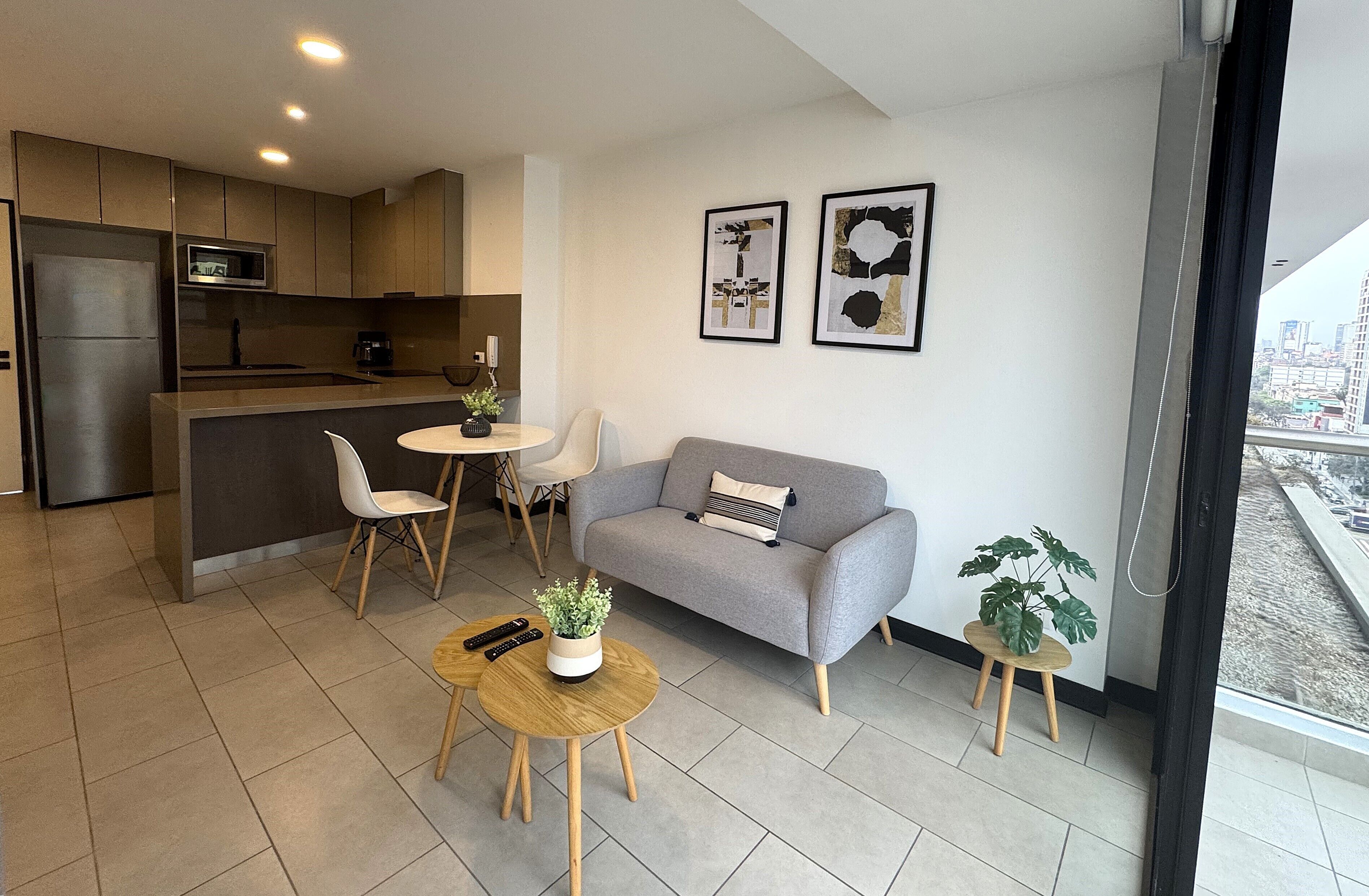 Apartamento empresarial, 1 quarto, serviço de arrumação | Área de estar | Smart TV 55 polegadas com canais a cabo