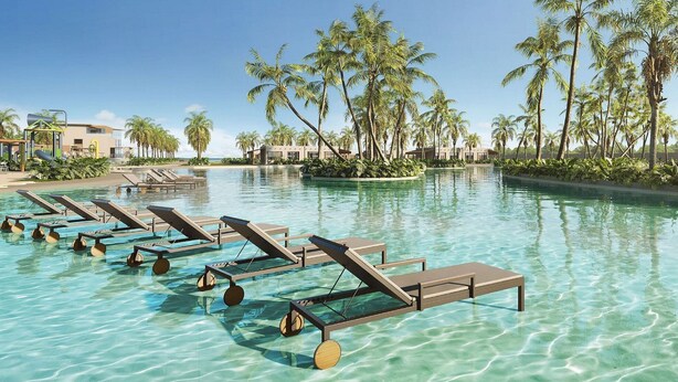 A pool with clear water, lounge chairs, and palm trees. - Jeriquiá Lagoa Resort - Gav Resorts (Cruz)