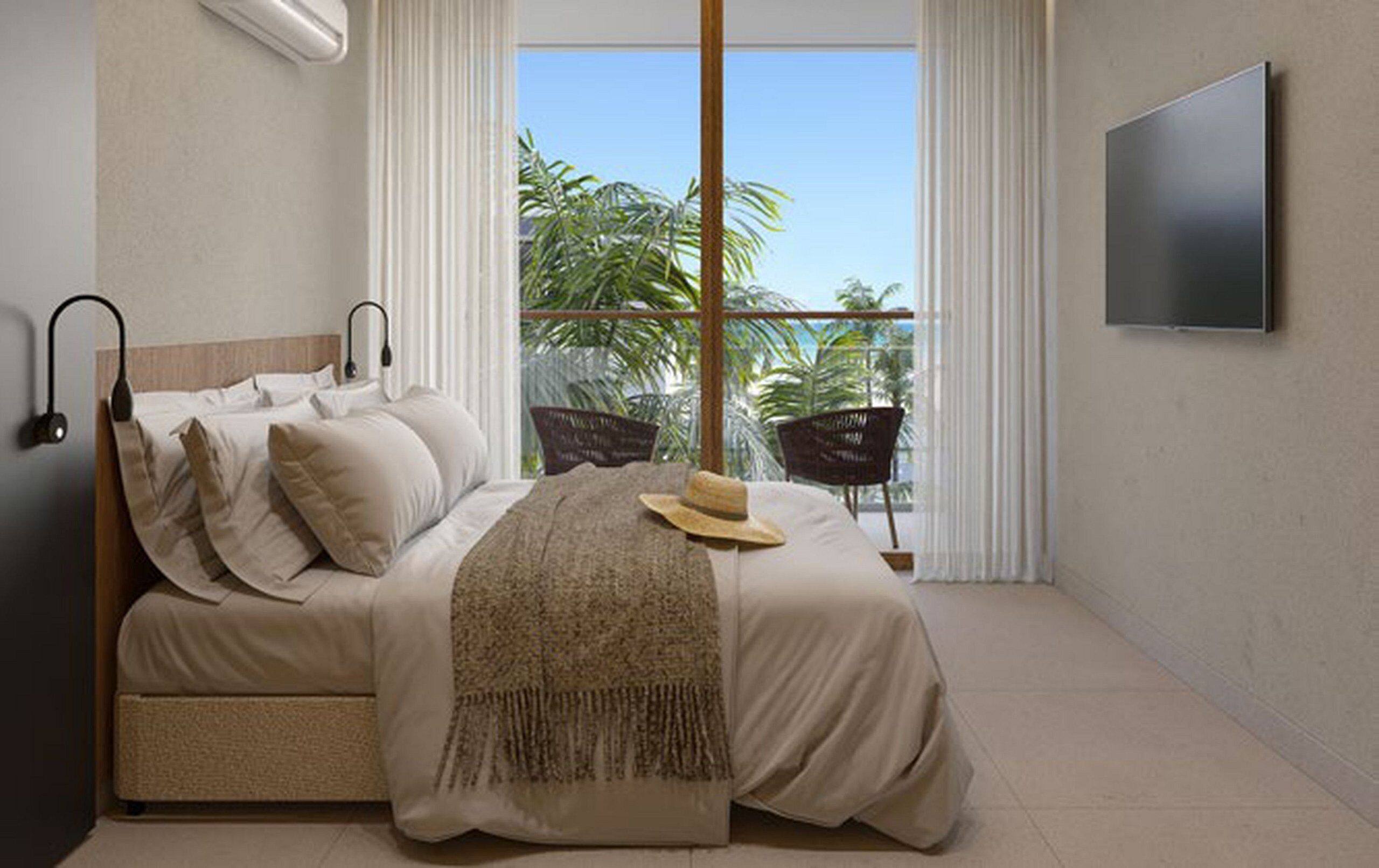 A bedroom with a bed, a TV, a window with a view of palm trees, and a balcony with chairs.