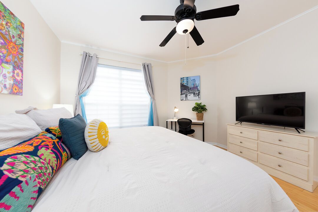 1 bedroom, desk, iron/ironing board, travel crib