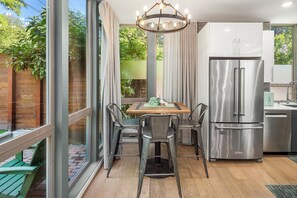 Fridge, microwave, oven, stovetop - Luxury Seattle Retreat with Rooftop Views, Prime Location, Amenities — 3BR, 2 BA (Seattle)