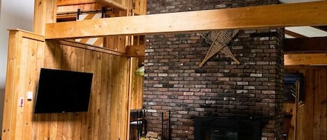 Smart TV, fireplace, video games, foosball