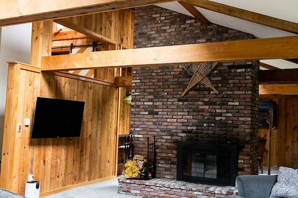 Smart TV, fireplace, video games, foosball