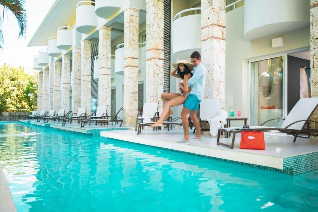 Twin Room, Balcony, Pool View | Pool | 5 outdoor pools