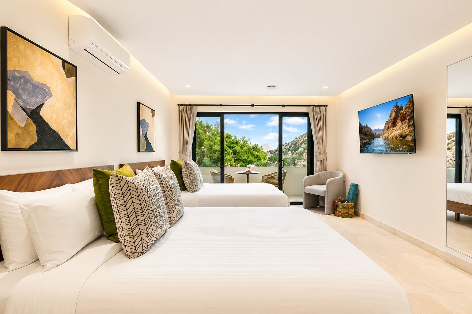 A hotel room with a large bed, a small table, a chair, and a balcony with a view.
