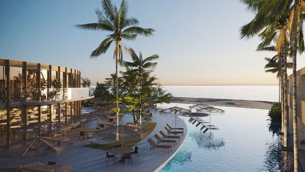 A poolside area with lounge chairs and umbrellas, palm trees, and a view of the sea. - Pipa Island Resort - GAV Resorts (Tibau do Sul)