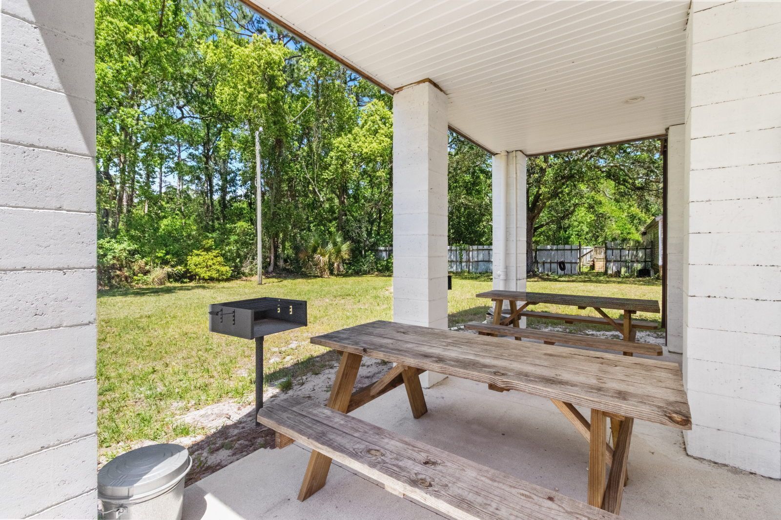 Unwind in the outdoor space with picnic tables, ideal for friendly BBQs or casual gatherings.