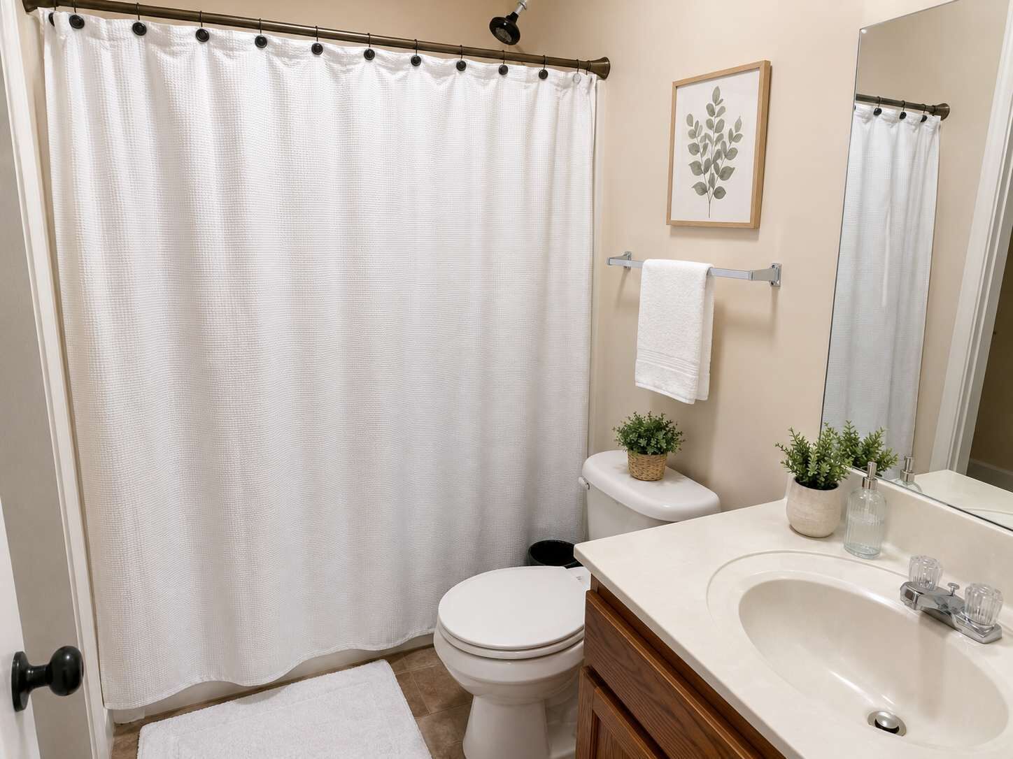 Shower, hair dryer, towels, shampoo