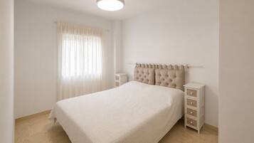 Tabla de planchar con plancha, Internet, ropa de cama