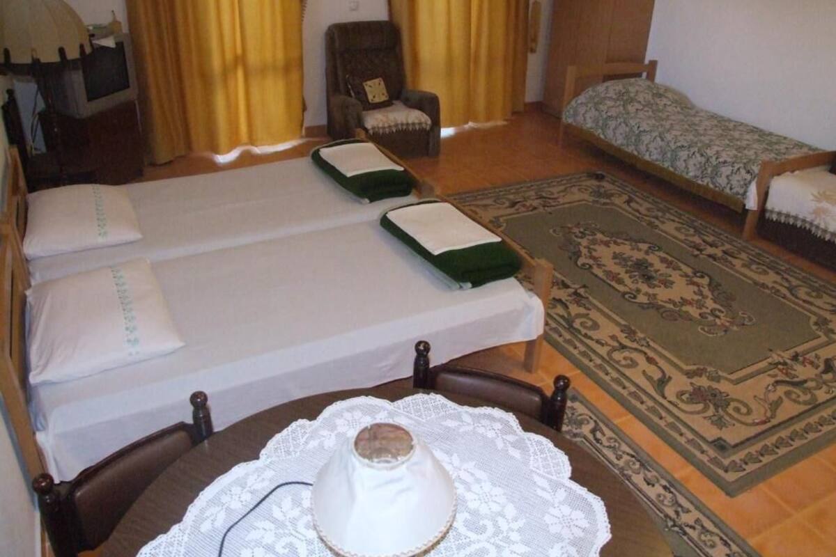 Economy Quadruple Room, Balcony, Pool View | Soundproofing, WiFi (free)